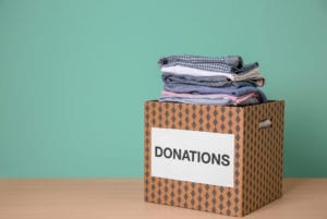 Donate or sell unwanted items before you store your clothes in a storage unit rented from Guardian Storage